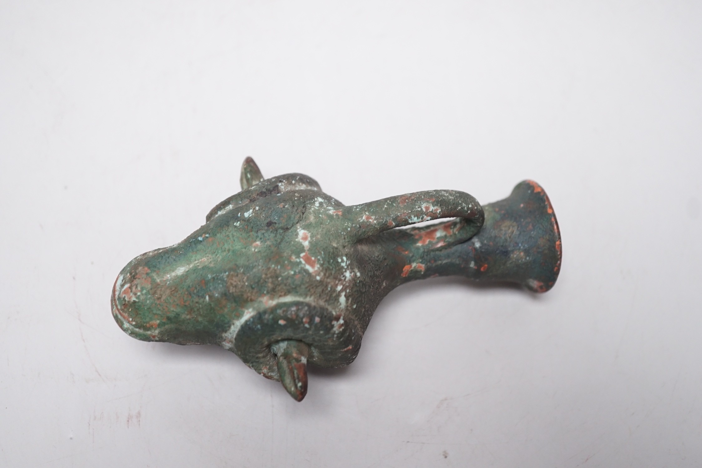 Grand Tour souvenir, a green painted terracotta ram's head Rhyton after the Antique, 13cm